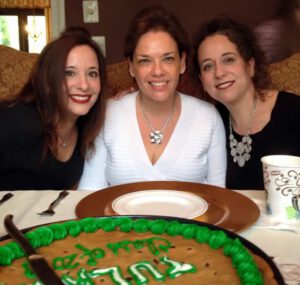Carole, center, with her sister Felice Weinbaum, left, and  Sabrina Goldberg on the right.