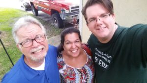 Tony Mercer, right, with his adoptive dad Lindy Mercer, and his biological mother,  Lydia Raska. 